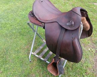 World War II German Nazi calvary officer's saddle with the original wooden stirrups and boot guard, very good condition, with SS emblem with Eagle and Swastika (hard to make out because it is worn) WEA41, size 3