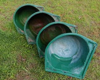 lot of four round shaped feeding troughs