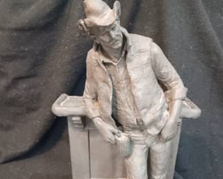 "Cutting the Dust" by Michael Garman 1938-2024 American sculptor, 10" x 10" base, stands 18" tall, 18 1/2 pounds