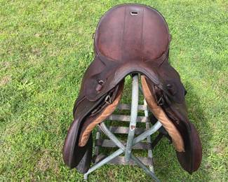 World War II German Nazi calvary officer's saddle with the original wooden stirrups and boot guard, very good condition