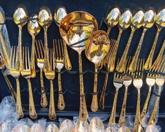 set of gold-toned flatware