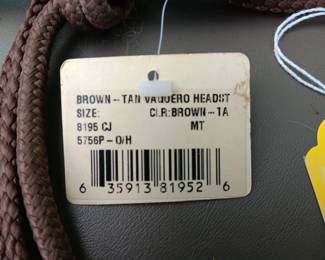 Lot#107: brown-tan Vaquero head stall, sash, pony bridle, lead line
