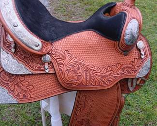 Custom saddle by Dale Chavez, 17", tooled leather with silver tone accents