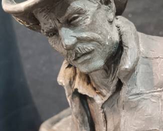 "Cutting the Dust" by Michael Garman 1938-2024 American sculptor, 10" x 10" base, stands 18" tall, 18 1/2 pounds