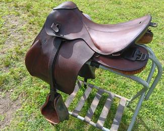 World War II German Nazi calvary officer's saddle with the original wooden stirrups and boot guard, very good condition