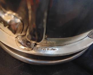 Pair of .999 silverized Horse Vases by Marcello Giorgio. Originally purchased in 2000 in New York City, we have the original receipt. Weight is 12 pounds each and 12" tall by 7" wide each.