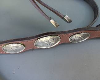 Lot #172: Headstall with silver tone detail and bit