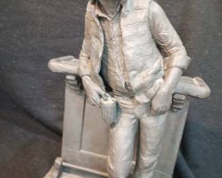 "Cutting the Dust" by Michael Garman 1938-2024 American sculptor, 10" x 10" base, stands 18" tall, 18 1/2 pounds