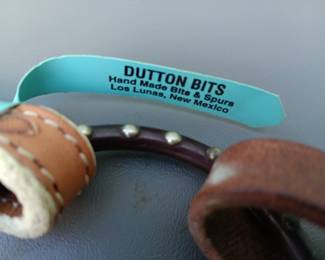 Lot #103: Tory Leather bridle with waxed rope and handmade copper-infused bit from Dutton Bits, Los Lunas, NM