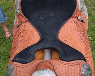Custom saddle by Dale Chavez, 17", tooled leather with silver tone accents
