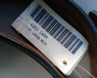 Lot #106: sash, rein, lead rope, bridle