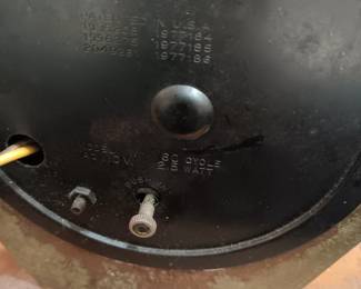 Brass clock with horse on wooden base.
No visible markings or signature. Base is 16" x 4 1/2". Horse is 11" tall. Weighs 8 pounds. The clock works.