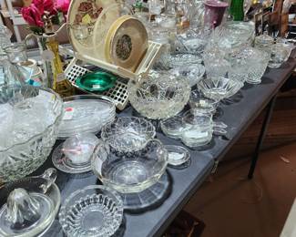 Punch bowls with cups, vintage ashtrays,  crystal pieces 
