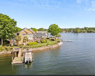 Private dock and boat lift. 183 feet of water frontage