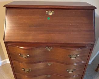 Serpentine slant front desk