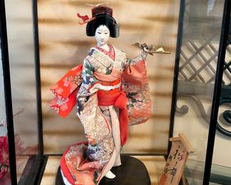 Japanese doll in case