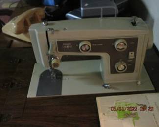 Sewing machine in cabinet