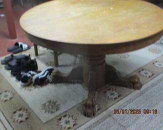 Antique oak table with claw feet