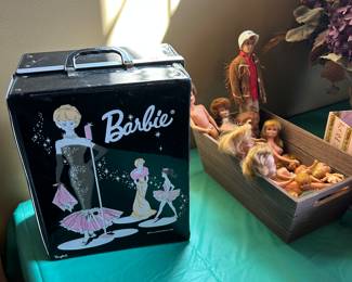 Vintage Barbie case, vintage Barbie dolls, her friends and vintage Ken doll and clothing