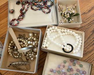 Assortment of quartz and other necklaces and more