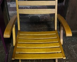 One of Four folding chairs