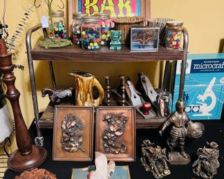 Albert Gillis copper wall art, wooden trivets, vintage marbles, brass figurines, beer advertising, hand planes