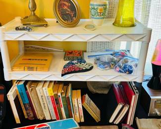 Vintage glass vase, books, brass lamp, vintage candles, vintage Pepsi commercial pop dispenser