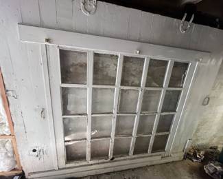 Awesome Antique Sliding Door. Measures 84 inches tall 103 inches Wide. It was once the garage door for this house. The spot was cinder blocked, but the door remains. Good Condition. Could be used in many ways (Barn, Shop etc.)