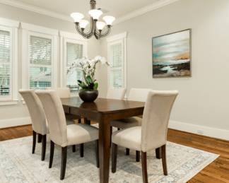 Wood table with chairs used for staging homes for sale, never used.