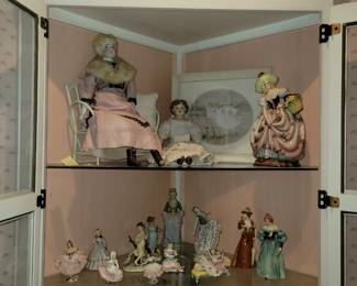 Antique figurines, dolls