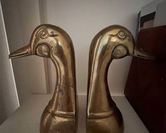 Pair of vintage brass duck head bookends, paperweights or doorstops. MCM 7 inches high, 3 inches wide at base