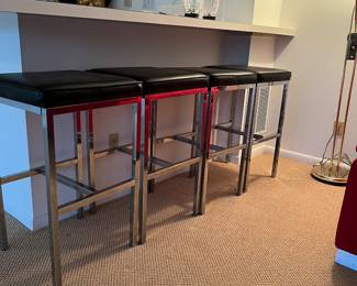 Set of 4 vintage bar stools with chrome legs and black leather seats. 18 square and 30 tall