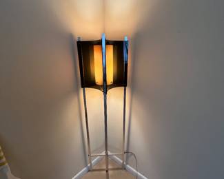 Mid century modern black and chrome floor lamp in perfect working condition. 55 tall, 12 inches across