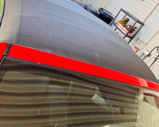 2010 red soft-top Mustang