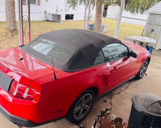 2010 red soft-top Mustang
