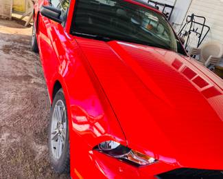 2010 red soft-top Mustang