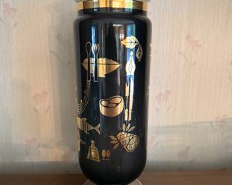This is an outstanding vintage mid-century, modern black with gold detail apothecary jar! It is an absolutely pristine condition with the lid no chips no cracks no paint loss!