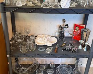 This is a shelf of lovely crystal and cut glass