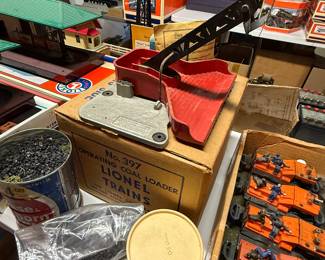 So many items from the Lionel train company! Large, small, multiple singles we even have cans full of miniature coal!
