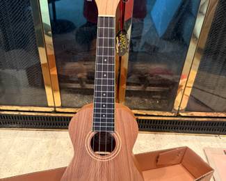 This This is an EXCELLENT MINT IN THE ORIGINAL UNOPENED BOX Oscar Schmidt OU2 Ukulele! I opened the box and took it out of the original wrapping for this pic. MINT MINT MINT!