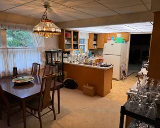 This is a wide shot of the dining room room kitchen area