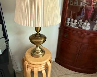 I love these great mid-century, modern blonde wood stacking tables. There are four to the set.!