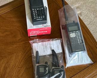 Back upstairs in the living room we have some terrific handheld communication devices short wave radio walkie-talkies etc!