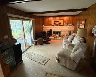 This is a wide shot of the family room in the back of the house. Everything is this home is simply pristine! 
