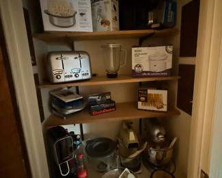 This closet might be a little dark in the hallway, but it’s filled great small electrical kitchen appliances