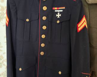 This of course, is one of the most recognizable uniforms in the entire world! This is an authentic 41S USMC dress blue jacket! It’s beautiful!