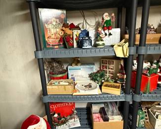 The shelves have lots of figurines from vintage to new!