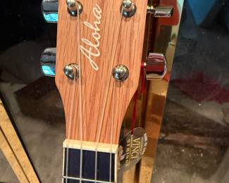 This is an EXCELLENT MINT IN THE ORIGINAL UNOPENED BOX Oscar Schmidt OU2 Ukulele! I opened the box and took it out of the original wrapping for this pic. MINT MINT MINT!