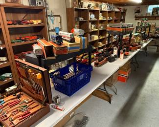Back in the basement, the Lionel train department. This is a wide shot. We have 68 foot banquet tables filled Woodland on train parts and accessories 