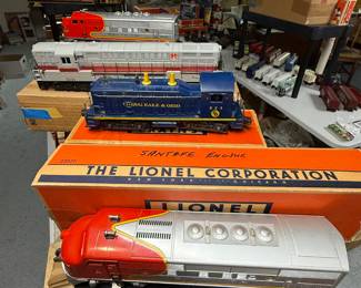Heat to the banquet tables has a shelf rack on top to give us more space here’s a rack of vintage engines!